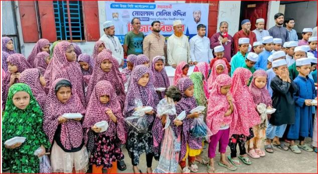 রাজধানীতে শিক্ষার্থীদের মধ্যে জামায়াতের হিজাব ও টুপি বিতরণ